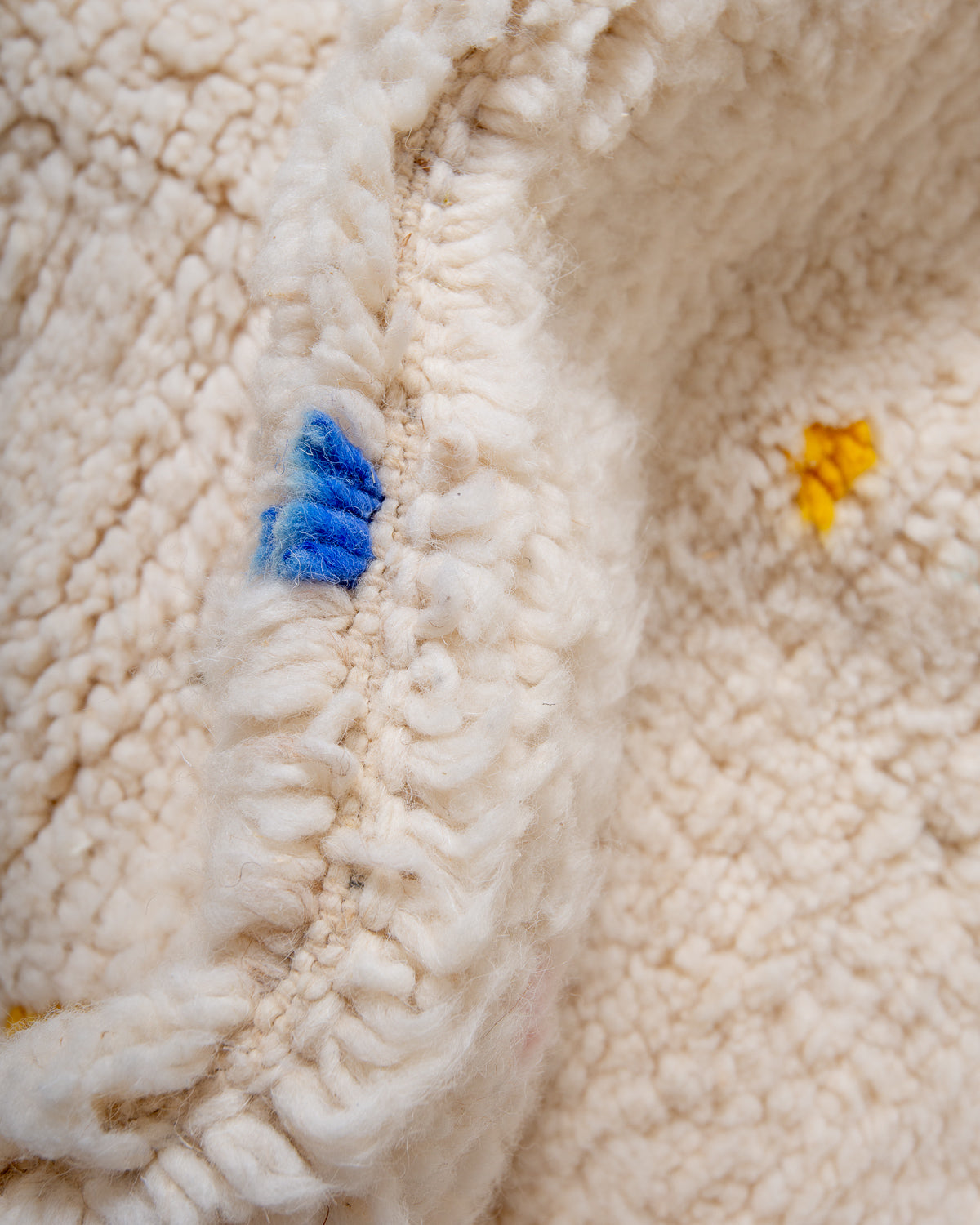 Modern, designer, handcrafted Berber rug from Morocco. Beniourain carpet with beautiful colours and patterns and fluffy wool texture.